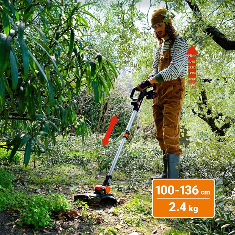 Pionowe obcinanie krawędzi trawnika przy krawężniku za pomocą akumulatorowej obrzynarki WORX WG173E.9