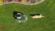 Inteligentne kamery Quad Vision AI w robocie Roborock Z115 omijające zwierzęta w ogrodzie
