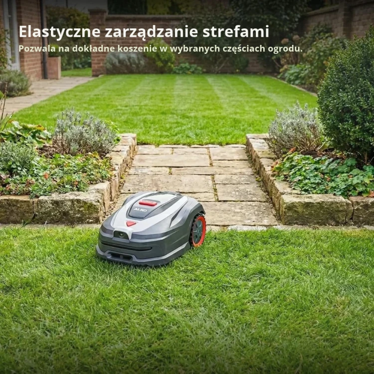Kompaktowa kosiarka AL-KO Robolinho Vision 500 manewrująca w wąskim przejściu